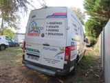 a van that is parked on the side of the road