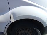 a close up of a car ' s tire with a flat tire