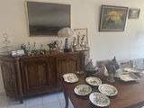 a table with a lot of plates on it in a room