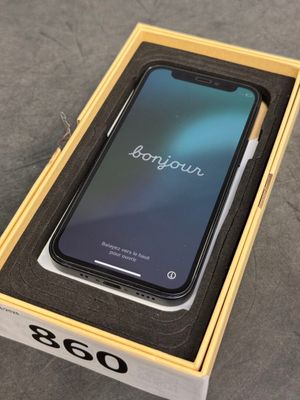a box with a phone inside of it sitting on a table