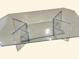 a glass table with a glass top on a white background