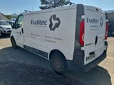 a white van that is parked in a parking lot