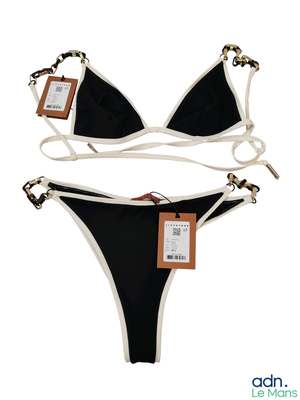 a black and white bikini set with a tag on it