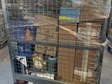 a large metal cage with a bunch of items inside of it