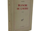 an old french book with a red and white cover on a white background