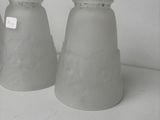 three vases that are sitting on a table