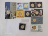 some gold coins are sitting on top of a white table