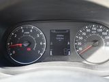 a close up of a car dashboard with a speedometer and gauges
