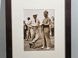 a picture of a man holding a golf club in a picture frame