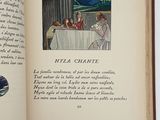 an open book with a picture of a woman sitting at a table