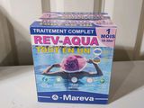 a box of rev - aqua tottenn on a table
