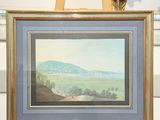 a picture of a painting on a easel in a room