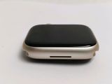 an apple watch sitting on a table with a white background