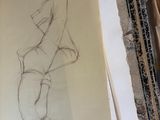 a drawing of a person sitting on a chair