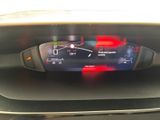 a digital display on the dashboard of a car