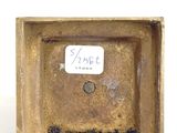 an image of a close up of a small box with a tag on it