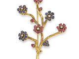 une broche en forme de fleur en or, saphir et diamants