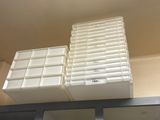 a shelf that has many containers on it
