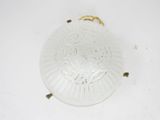a glass plate with a gold ring on it