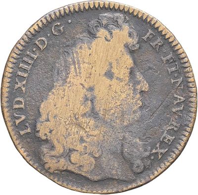a close up of a coin on a white background