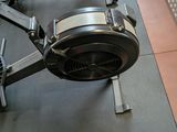 a machine that is sitting on the floor next to a wall