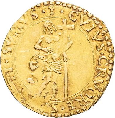 a gold coin with an image of a man holding a sword