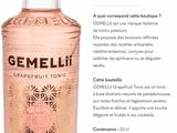 une image représentant une bouteille de tonic au pamplemousse sur fond blanc