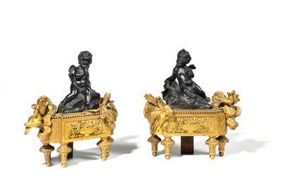 pair of bronze figurines of a woman and a child on a carton