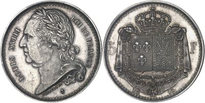 a close up of a coin with a crown on top of it
