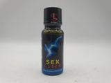 un gros plan d'un flacon de parfum « Sex Line » posé sur une surface blanche