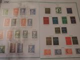 une photo d'une feuille de timbres sur laquelle figurent des numéros