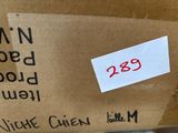 a cardboard box with a sticker on it that says don ' t open