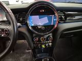 a car dashboard with a steering wheel and a dash board