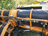 an image of a machine that is sitting in the grass