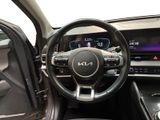 the interior of a car with a steering wheel and dashboard controls