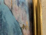 a picture of a painting on the wall of a room
