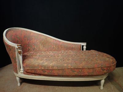 a couch that is sitting on the floor in the room