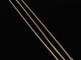 a gold plated necklace with a chain that is attached to it