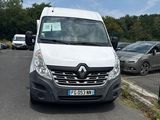 a white van that is parked on the side of the road