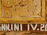 a picture of an old wooden window with a sign on it