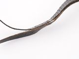 a piece of leather that has been cut in half