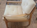 a chair that is sitting on a hard wood floor