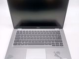 a laptop computer that is sitting on a table