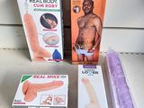 a box of real men ' s sex toys and a package of real men ' s sex toys
