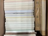 a box full of books sitting on a table