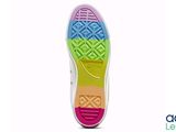 the sole of a pair of colorful shoes on a white background