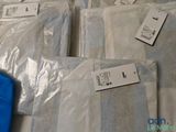 a lot of bags that are sitting on a table