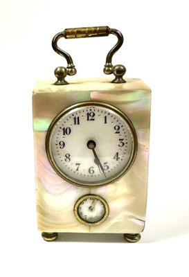 a clock that is sitting on top of a table