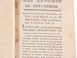 an old book opened to a page with a picture of a cat