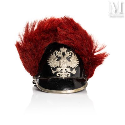 a helmet with a red mohawk on it